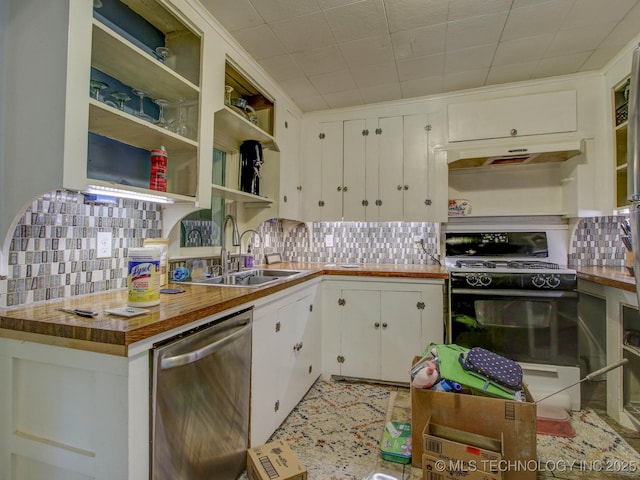 kitchen with white cabinetry, sink, stainless steel dishwasher, black gas stove, and decorative backsplash