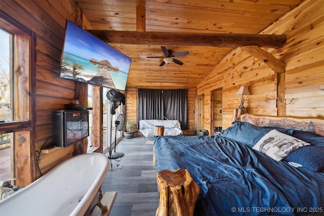 bedroom with vaulted ceiling with beams, dark hardwood / wood-style floors, and wood ceiling