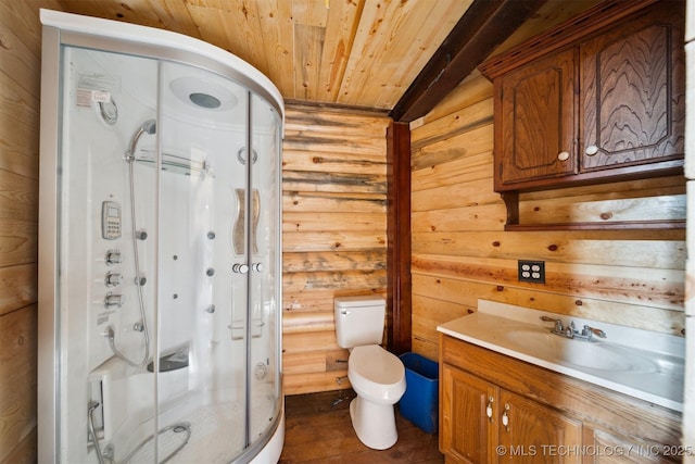 bathroom with vanity, a shower with door, log walls, wooden ceiling, and toilet