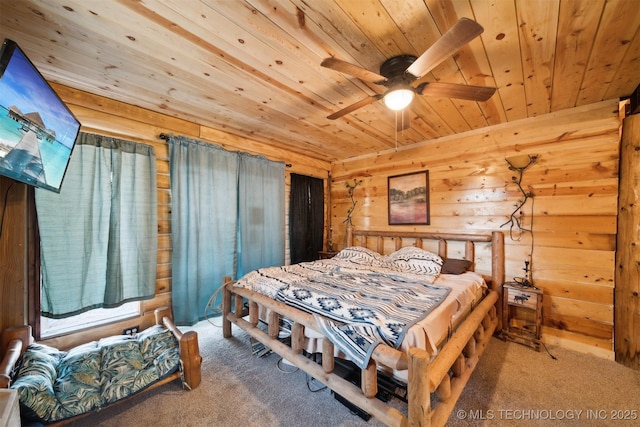 carpeted bedroom featuring ceiling fan and wood ceiling