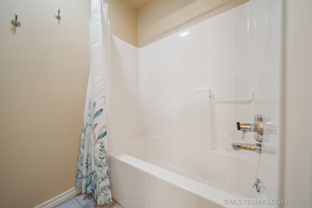 bathroom featuring shower / tub combo