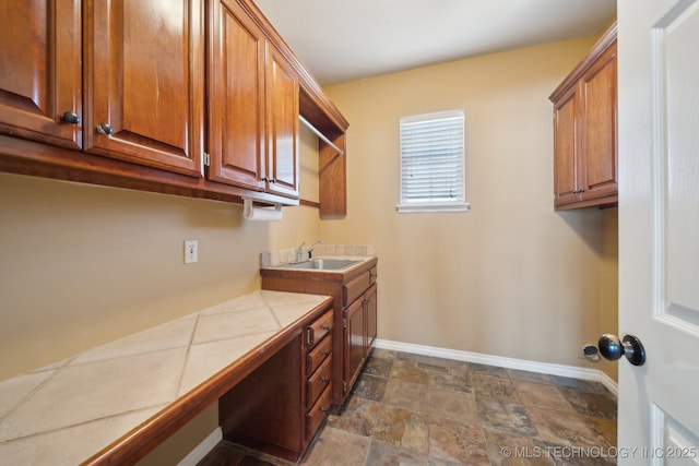 laundry area with sink