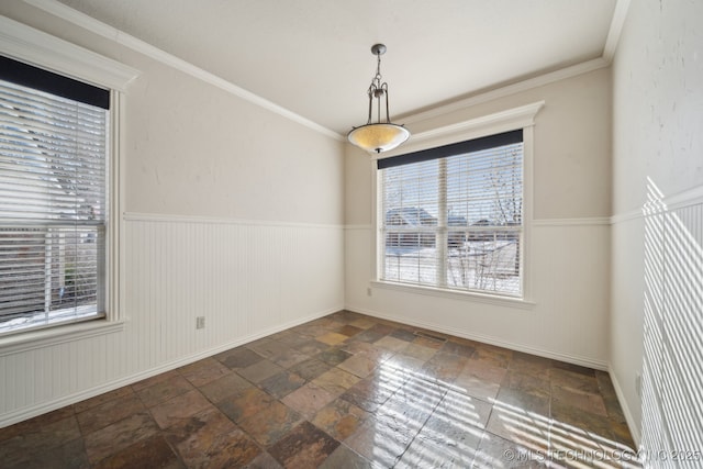 spare room featuring ornamental molding