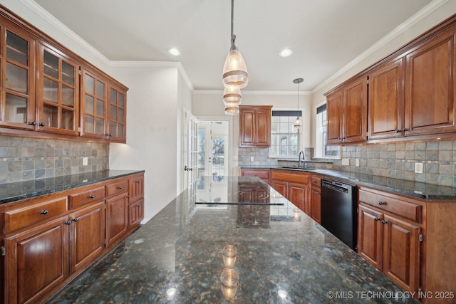 kitchen with glass insert cabinets, hanging light fixtures, black appliances, and tasteful backsplash