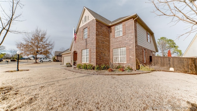 view of home's exterior with a garage