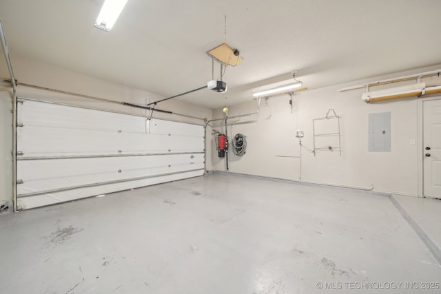 garage with electric panel and a garage door opener
