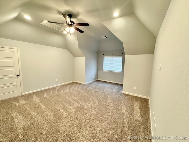 bonus room with ceiling fan, carpet floors, and vaulted ceiling