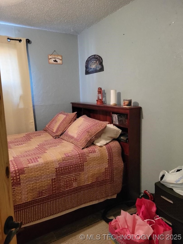 bedroom with a textured ceiling