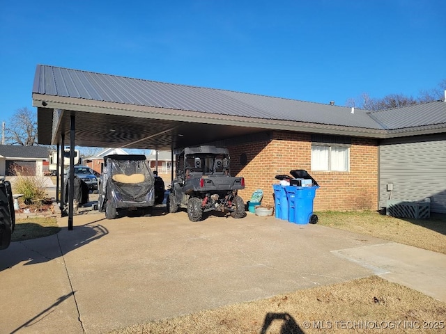 view of parking / parking lot with a carport