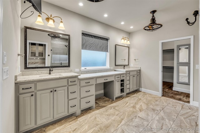 bathroom featuring vanity and walk in shower