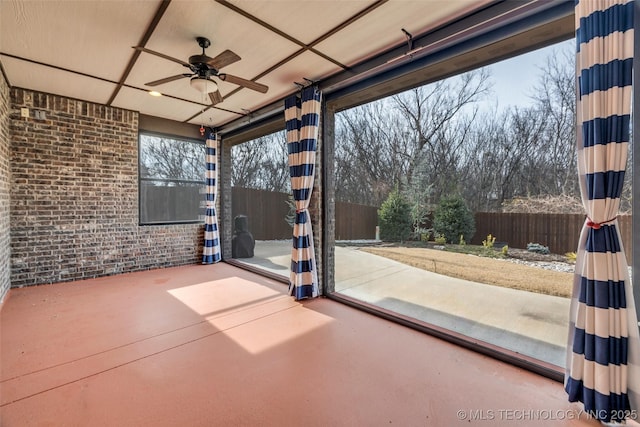 interior space featuring ceiling fan