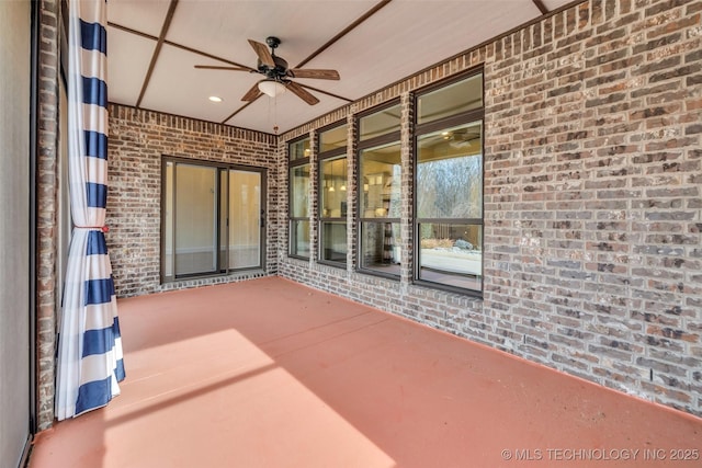 view of patio / terrace featuring ceiling fan