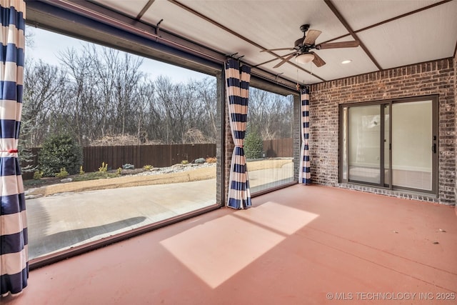 view of patio featuring ceiling fan