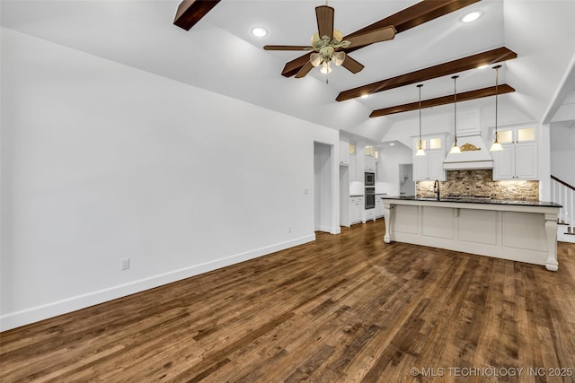 12050 S 68th E Ave E, Bixby, OK 74008 - unfurnished living room featuring ceiling fan, dark wood-style flooring, and recessed lighting