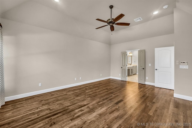 12050 S 68th E Ave E, Bixby, OK 74008 - unfurnished bedroom featuring dark wood-style floors, high vaulted ceiling, ensuite bath, recessed lighting, and a ceiling fan