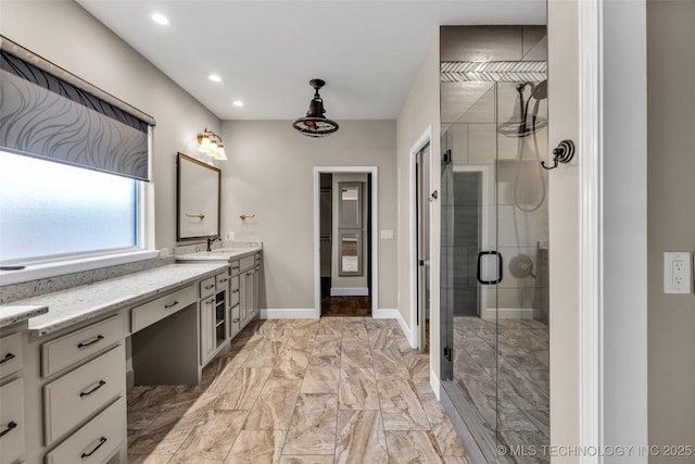 12050 S 68th E Ave E, Bixby, OK 74008 - bathroom featuring double vanity, a stall shower, recessed lighting, and marble finish floors