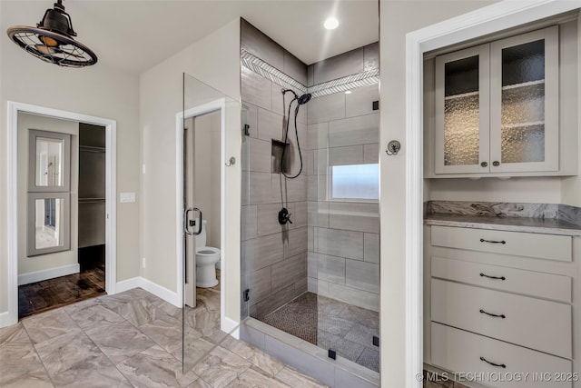 12050 S 68th E Ave E, Bixby, OK 74008 - bathroom featuring a stall shower and marble finish floors