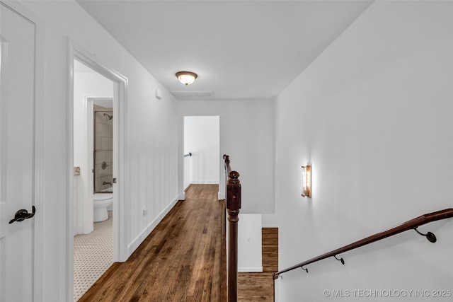 12050 S 68th E Ave E, Bixby, OK 74008 - corridor featuring dark wood finished floors and baseboards