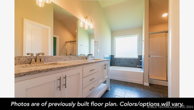 bathroom with tile patterned floors, vanity, lofted ceiling, and plus walk in shower