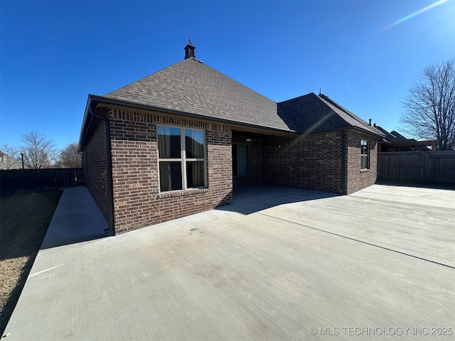 rear view of house with a patio