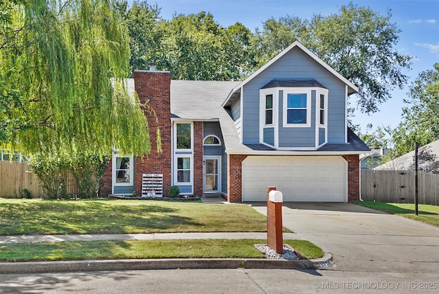 view of front facade featuring a front yard and a garage