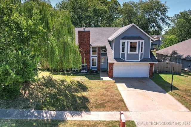 view of front of home featuring a front lawn and a garage