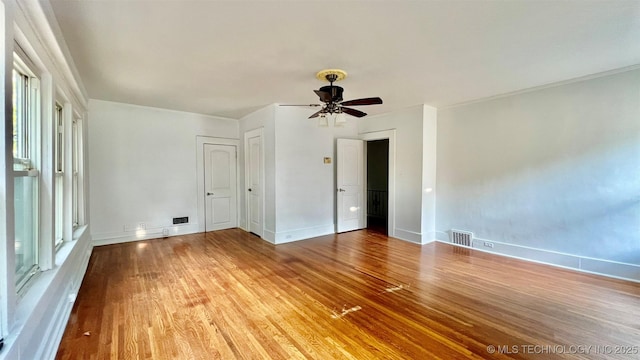 spare room featuring ceiling fan and wood-type flooring