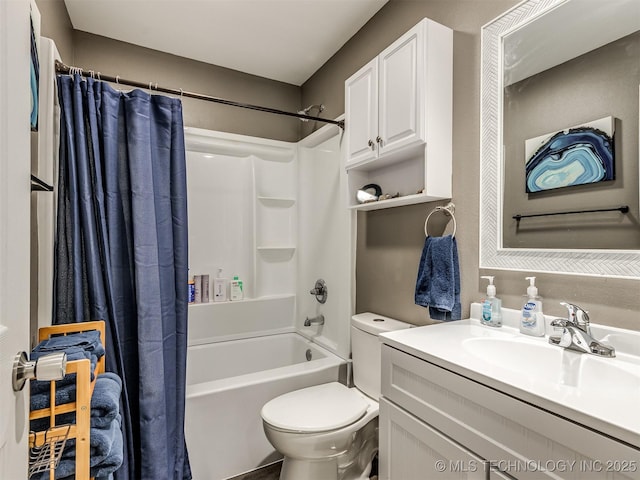 full bathroom featuring shower / bath combo, toilet, and vanity