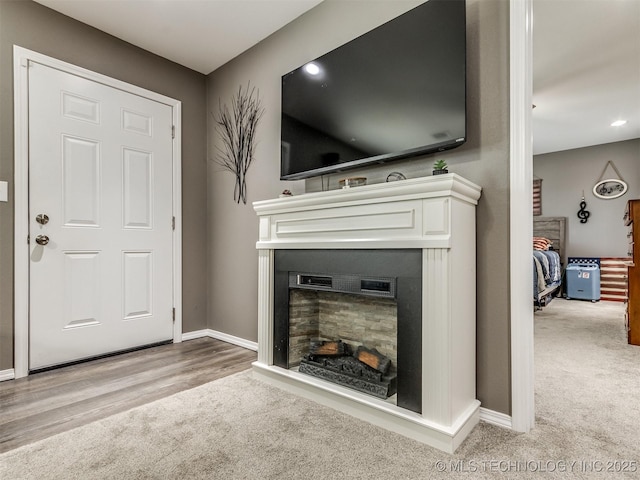 unfurnished living room featuring carpet