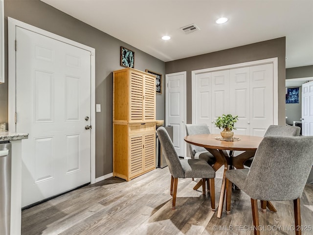 dining area featuring light hardwood / wood-style flooring