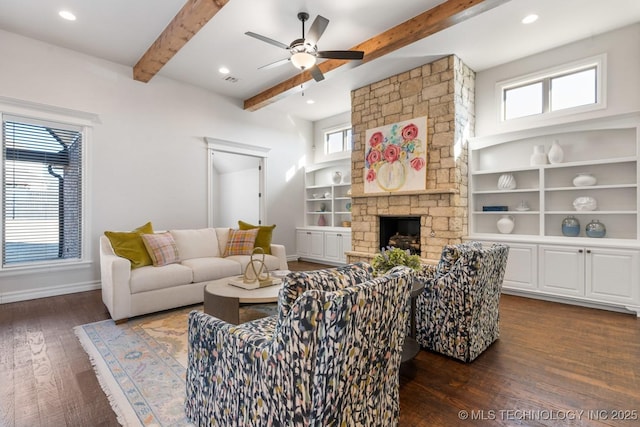 3913 S Dogwood Blvd, Broken Arrow, OK 74012 - living area featuring built in shelves, a fireplace, baseboards, beam ceiling, and dark wood-style floors