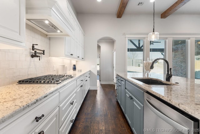 3913 S Dogwood Blvd, Broken Arrow, OK 74012 - kitchen featuring premium range hood, appliances with stainless steel finishes, a sink, and white cabinetry