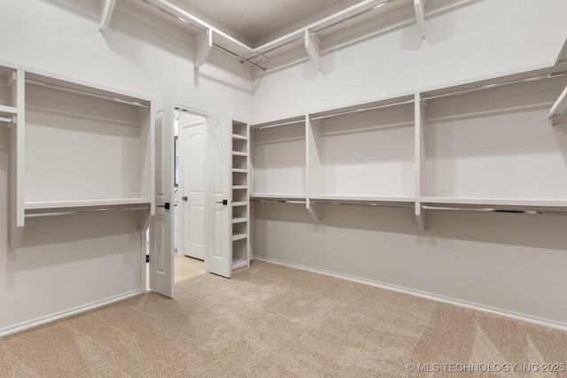 3913 S Dogwood Blvd, Broken Arrow, OK 74012 - walk in closet with light colored carpet