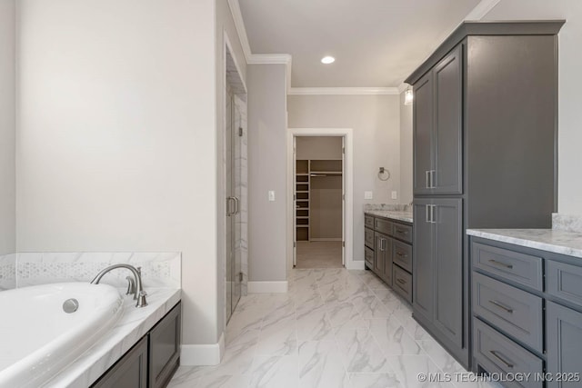 bathroom featuring vanity, ornamental molding, and independent shower and bath