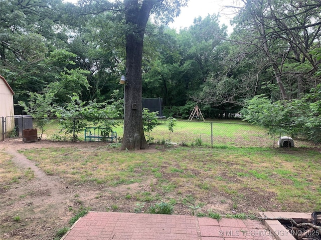 view of yard featuring a trampoline