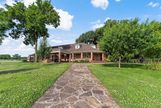 view of front of home with a front yard