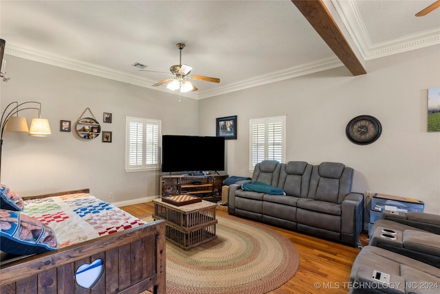 living room with crown molding, light hardwood / wood-style flooring, ceiling fan, and beamed ceiling