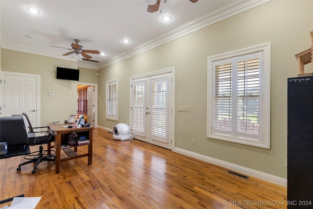 office area featuring ceiling fan, french doors, light hardwood / wood-style floors, and ornamental molding