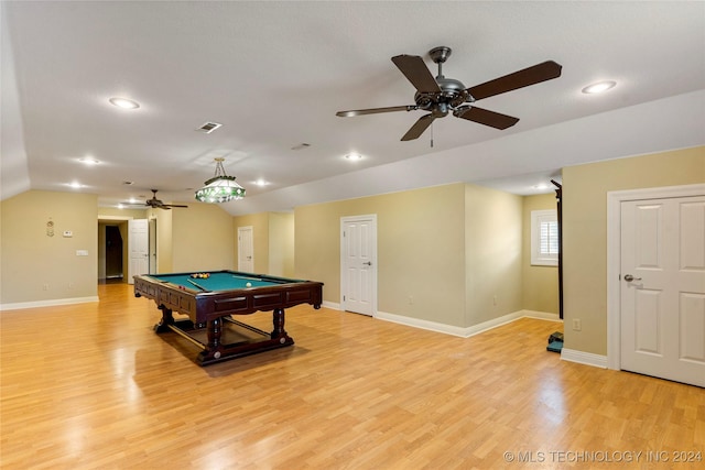 rec room featuring ceiling fan, light hardwood / wood-style floors, vaulted ceiling, and billiards