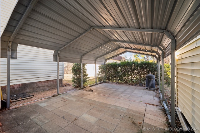 view of patio / terrace with a carport