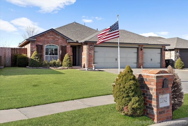 ranch-style home featuring a front yard and a garage