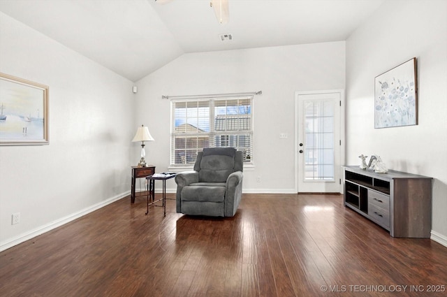 sitting room featuring ceiling fan, lofted ceiling, and dark wood-type flooring