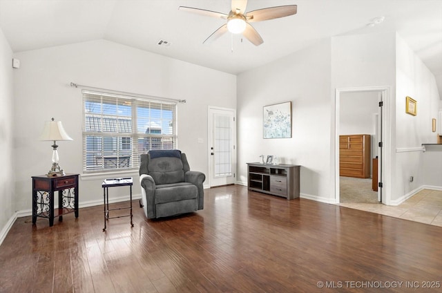 sitting room featuring wood-type flooring, ceiling fan, and lofted ceiling