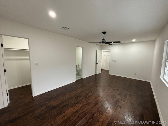 interior space featuring dark hardwood / wood-style floors and ceiling fan