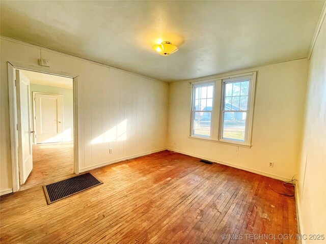 empty room featuring light hardwood / wood-style floors