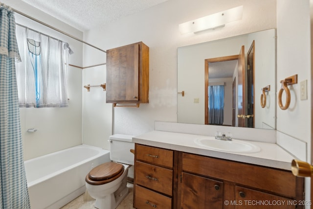 full bathroom with vanity, shower / bath combination with curtain, toilet, and a textured ceiling