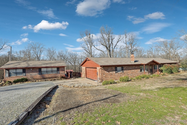 ranch-style house featuring a garage