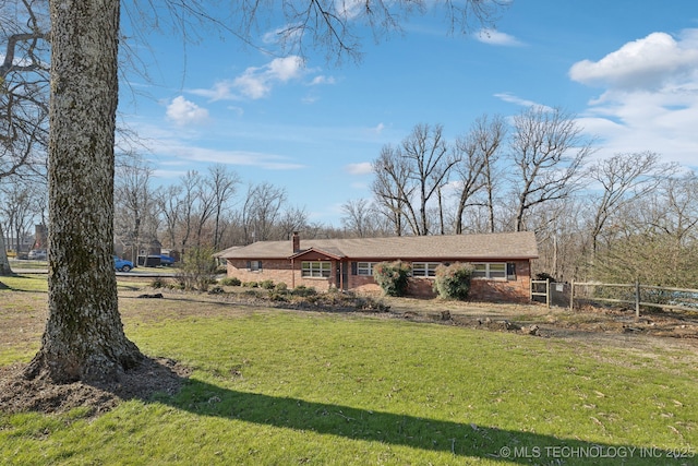 view of front of property with a front lawn