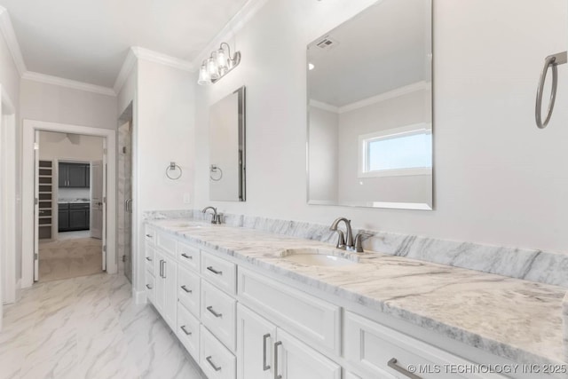 bathroom featuring vanity and ornamental molding