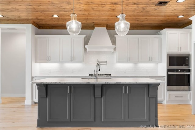 kitchen featuring white cabinets, stainless steel oven, wooden ceiling, and premium range hood